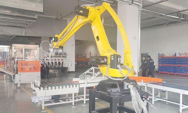 Robot arm assembling auto parts